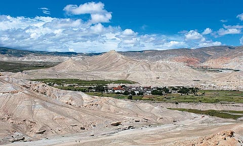 Strategically positioned on the trade route, the city of Lo Manthang became so wealthy that it needed to secure itself behind a 26ft-high wall punctuated by a series of 14 watchtowers. A single gate allowed access to the 180 houses within, which till a fe