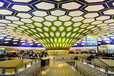 The wristbands will be handed out at Abu Dhabi airport