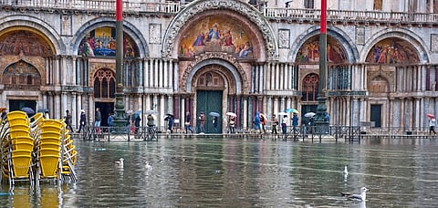 St. Mark's Square, Venice's popular communal point flooded by high tide
