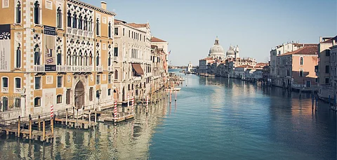 An otherwise crowded canal in Venice stands empty during lockdown