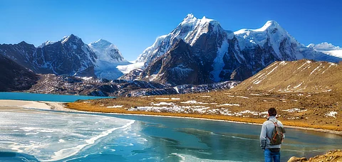 A tourist at North Sikkim's magnificent Gurudongmar Lake