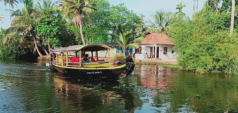 Tourists and locals use ferries to navigate Kerala's backwaters