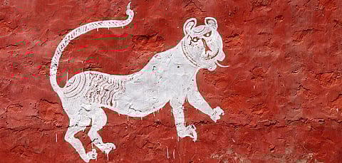Mural of a tiger on a village wall in Sawai Madhopur