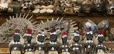 Wooden voodoo dolls at a fetish market