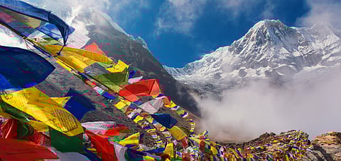 Prayer flags at the Everest basecamp with Mt Annapurna in the backdrop