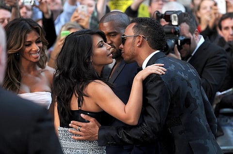 2014-ല് ലണ്ടനില് നടന്ന ജിക്യു മെൻ ഓഫ് ദ് ഇയർ അവാര്ഡ് വേദിയിൽ കിം കര്ദാഷിയാനും ലൂയിസ് ഹാമില്ട്ടണും