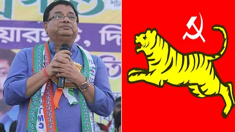 উদয়ন গুহ (বামে)