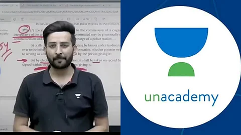 শিক্ষক করণ সাংওয়ান (বামদিকে)