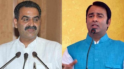 সঞ্জীব বলিয়ান (বাম দিক) এবং সঙ্গীত সোম (ডান দিক)