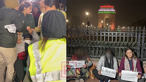 ইন্ডিয়া গেটের সামনে থেকে বিক্ষোভরত নির্যাতিতা ও তাঁর মাকে তুলে নিয়ে যাচ্ছে পুলিশ