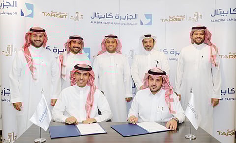 مسؤولو الشركنين عقب توقيع الاتفاقية