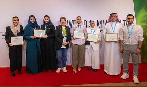 ممثلو "البلديات والإسكان" عقب الحصول على شهادة التميُّز العالمية بسويسرا