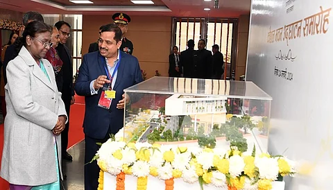 NBCC CMD KP Mahadevaswamy explaining the features of NBCC built Kaushal Bhawan to President of India Droupadi Murmu with the help of model