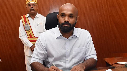 Alt="Johny Tom Varghese (IAS)"