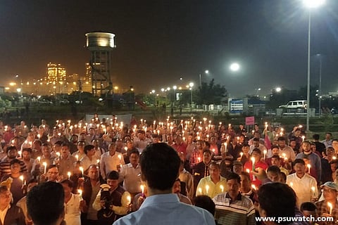 Over 13,000 workers hold candle march against NTPC disinvestment