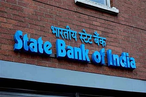 SBI pays Rs 6,959 crore dividend to Govt