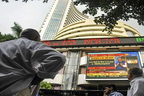 Markets climb in early deals ahead of Budget presentation; Sensex climbs 264 points