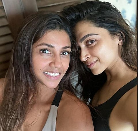 deepika with fitness trainer