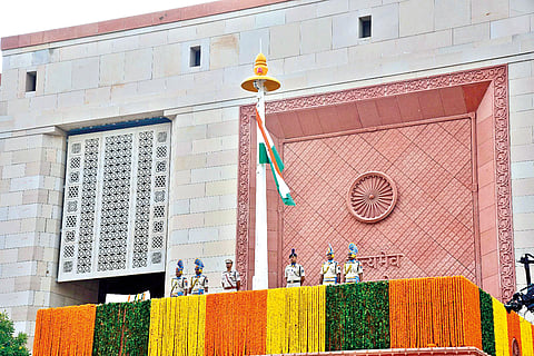 **EDS: IMAGE VIA @VPIndia** New Delhi: Flag hoisted by Vice-President & Chairman, Rajya Sabha, Jagdeep Dhankhar (unseen) at the Gaja Dwar at the New Parliament Building, in New Delhi, Sunday, Sept. 17, 2023. (PTI Photo) (PTI09_17_2023_000331B)