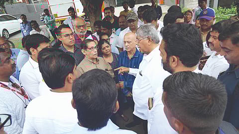 Higher and Technical Education Minister Chandrakant Patil and officials during the inspection of Baner-Pashan road