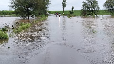 Flood water on the Abdul Lat-herwad Main road
