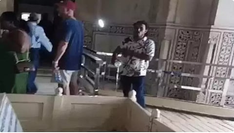 Young people offering 'Ganga Jal' at the Taj Mahal