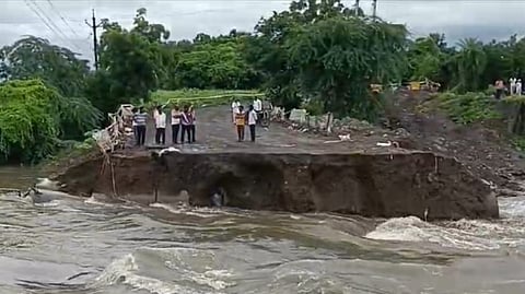 A temporary bridge on the Parli-Beed road was washed away