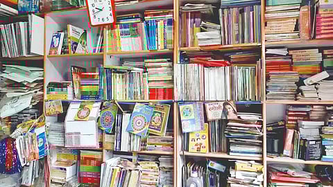 children-waiting-for-notebooks-and-textbooks