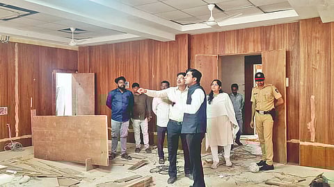 "Collector-Amol-Yedge-Inspects-Circuit-Bench-Building"