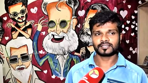 கேரிக்கேச்சர் வரையும் இளைஞர் கேம்பியன்