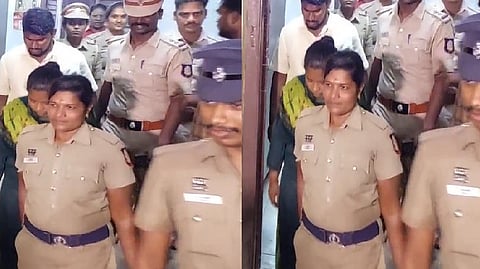 இளம் பெண்ணை மீட்டு வரும் போலீசார்