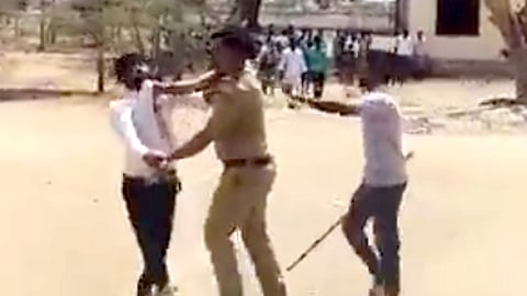 போலீஸ் மீது தாக்கு