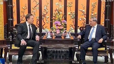 எலான் மஸ்க் -லீ கியாங்