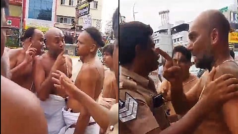 வாக்குவாதத்தில் ஈடுபட்டவர்கள்