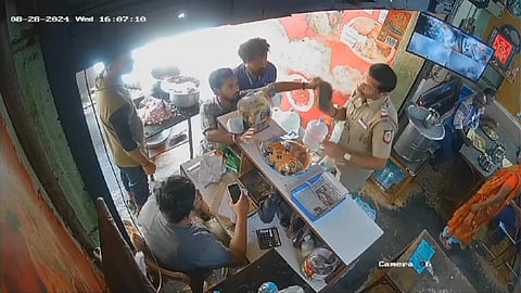 ஷூவை கழற்றி அடிக்க முயற்சி