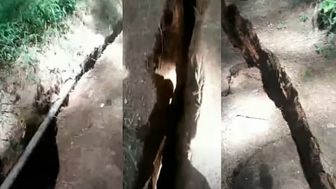 நிலத்தில் ஏற்பட்டுள்ள பள்ளம் விரிசல்