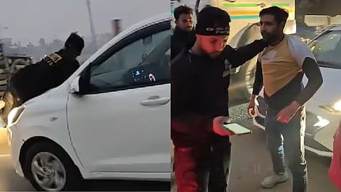 காரின் பேனெட்டில் சமீர்