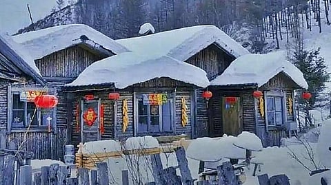 chinese village uses fake cotton snow to attract tourists
