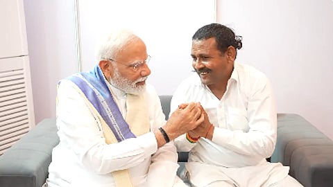 prime minister modi buys shoes for man who hasnt worn shoes in 14 years