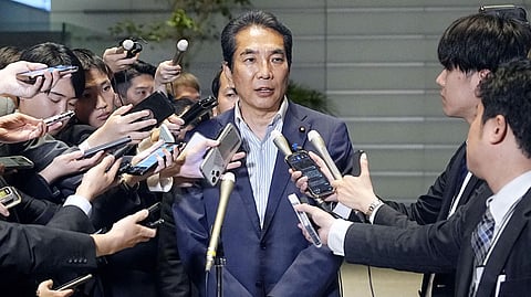 what reason of japan farm minister resigns