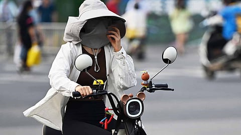 chinese women afraid of tanning suffers fractures from rolling over in bed