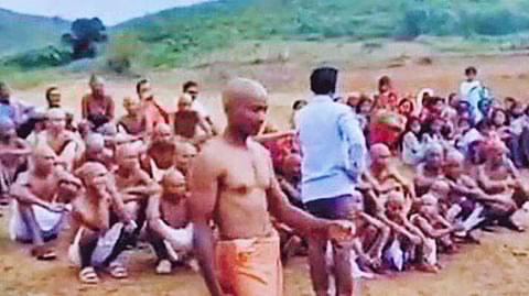 40 family members shave heads after inter caste marriage in odisha