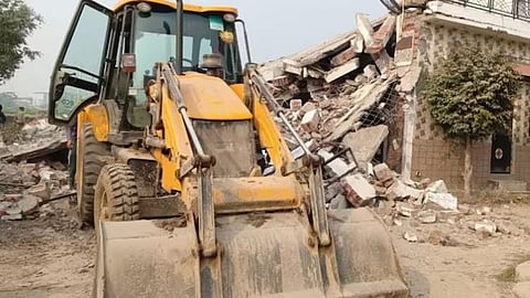 bulldozer action assam forest border houses