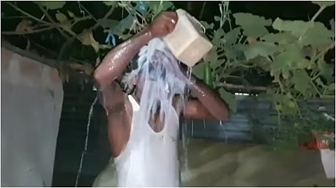 assam man celebrates divorce bathing in milk