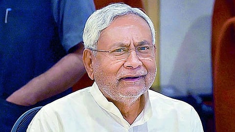 bihar cm nitish kumar pulls womans hijab at event