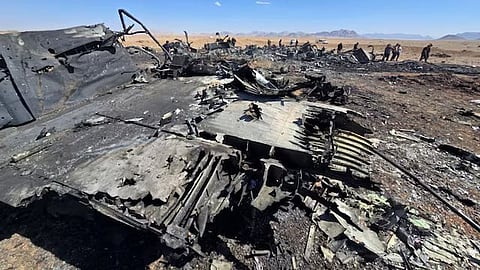 wreckage of american aircraft and helicopter