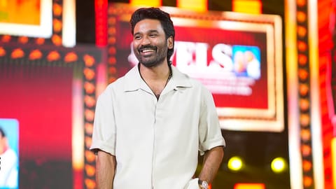 They bully me for my lean body at first says Dhanush