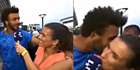 கேள்வி கேட்ட பத்திரிகையாளரை முத்தமிட்ட டென்னிஸ் வீரர்