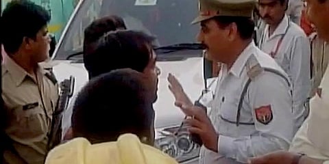 போலீசை அறைந்தார் பாஜக எம்எல்ஏ