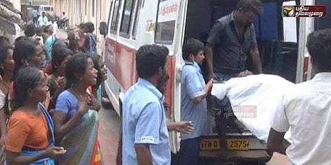 வெட்டியதால் மனைவி இறந்து விட்டதாக அச்சம்... மின்கம்பியை கடித்து கணவர் தற்கொலை